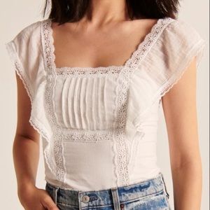 NWOT Abercrombie Lace Trim Flutter Sleeve Top in White - Size Medium